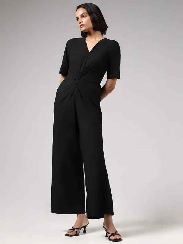 VNeckTopExplorerWardrobe Solid Black V-Neck Jumpsuit