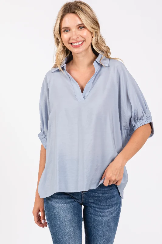 VNeckTopGlowLight Blue V-Neck Short Sleeve Top